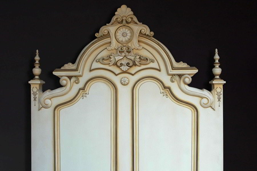 Headboard carving at the crest detail view