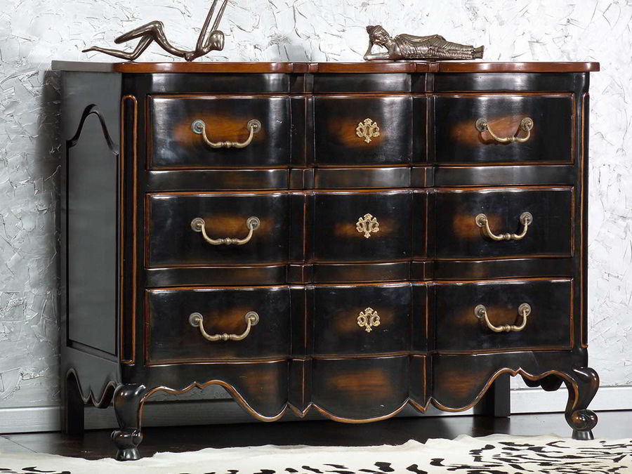 The commode in full view, beveled edges and raised top of the floated panels on the left side is shown here.